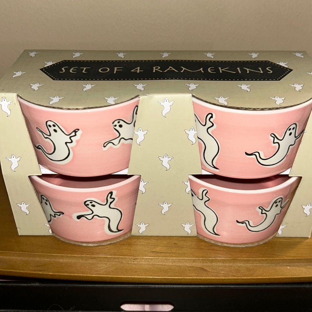 4 Prima Design ramekins that are pink and decorated with ghosts.